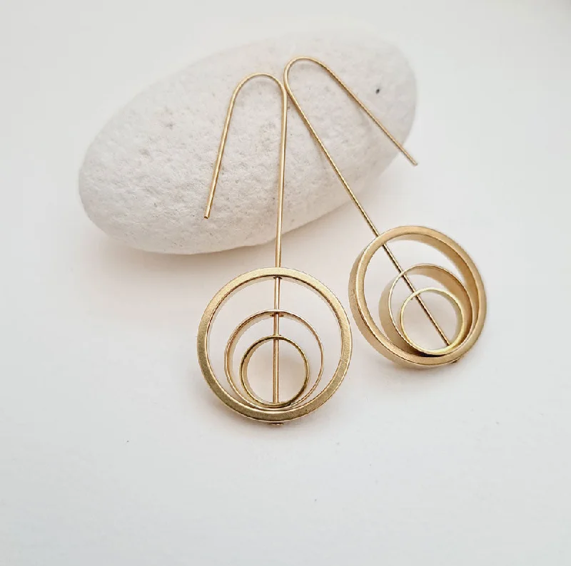 Consta rings within rings earrings by brass + bold